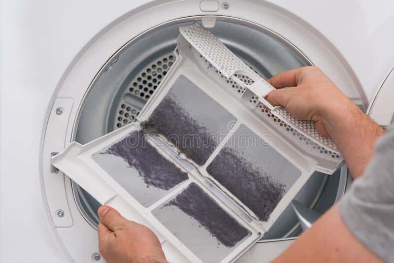man shows dust dirt trapped use clothes dryer filter man shows dust dirt trapped use clothes 204224591